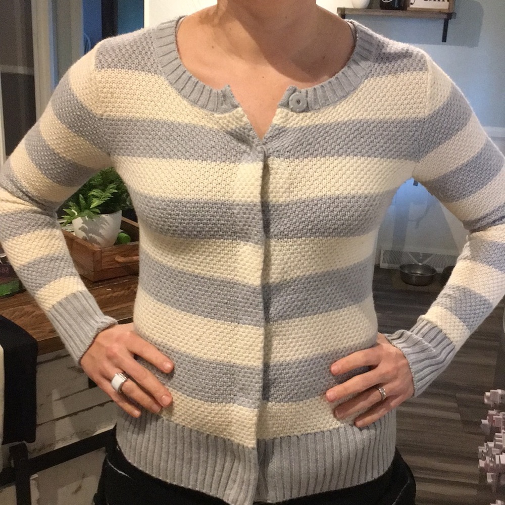 Knitted gray and white striped snap button sweater